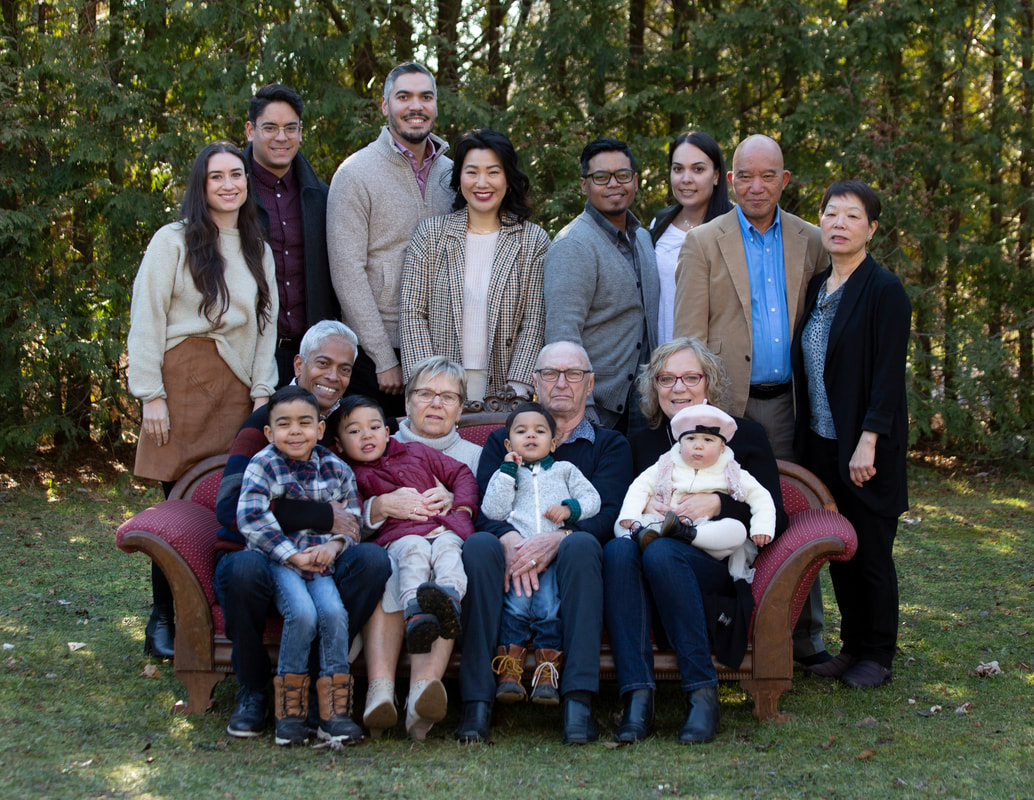 Inter racial large family multi generational photo session