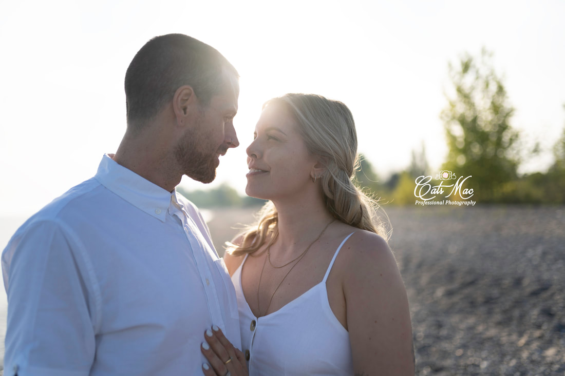 Cobourg Beach engagement photo session low sun angle