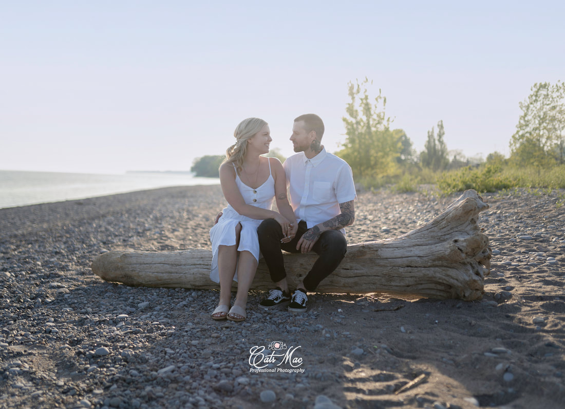 Cobourg engaged couple beach photos
