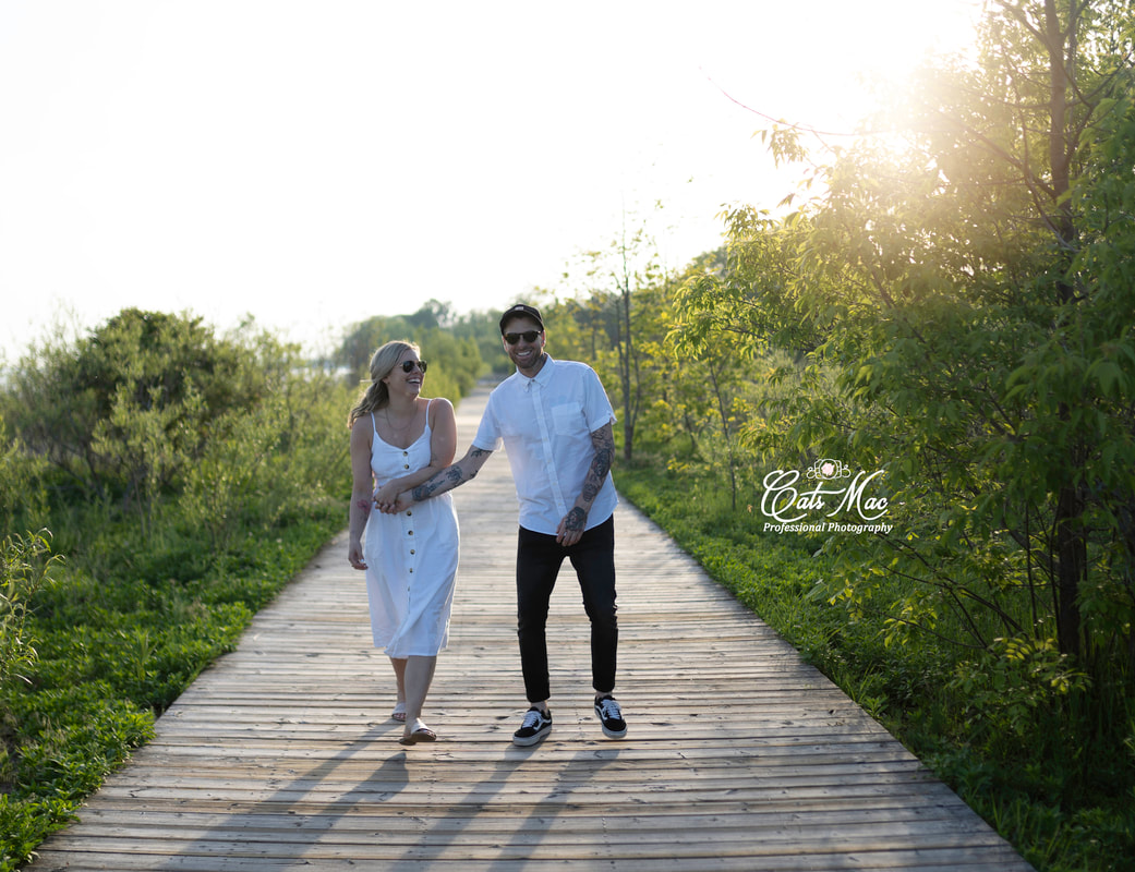 Cobourg beach boardwalk photo session couple