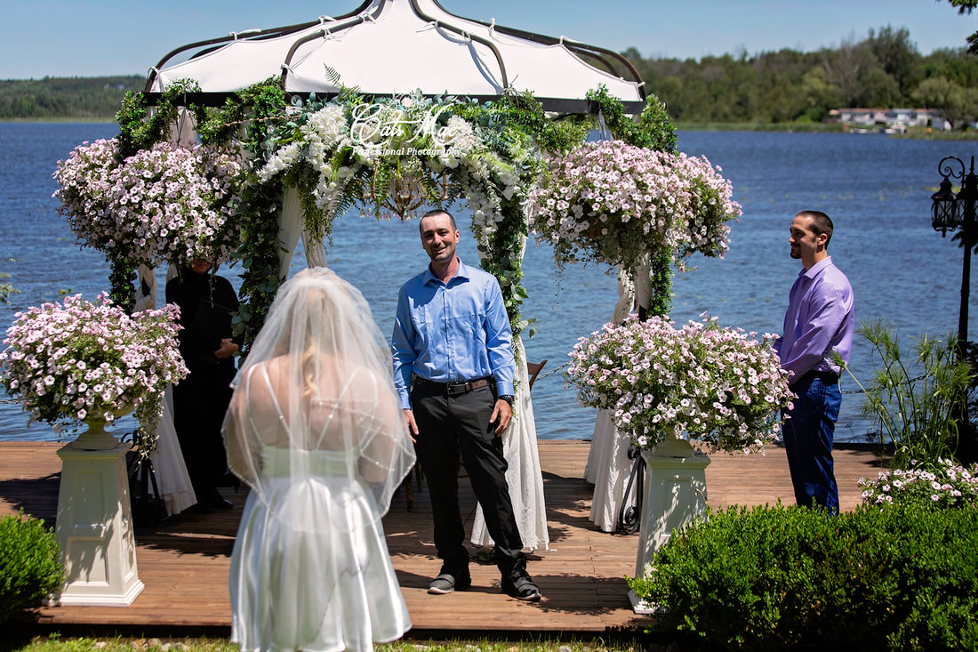Stillwater on the Lake wedding first look groom