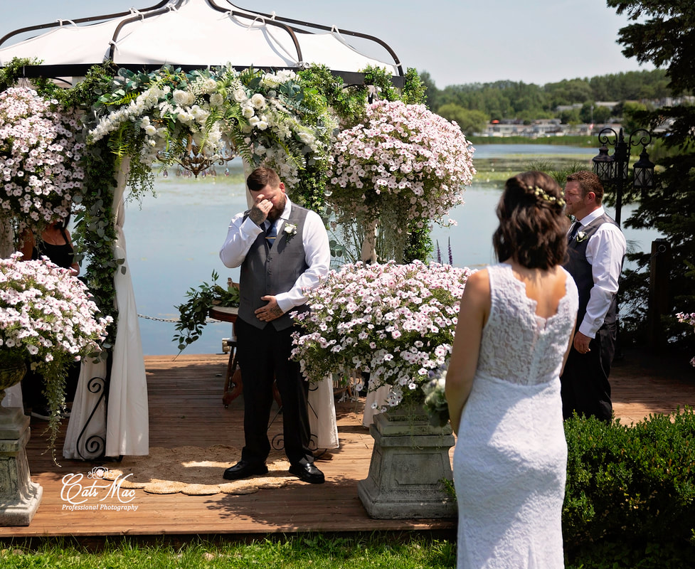 Emotional first look Stillwater on the Lake Chemong bride groom elopement