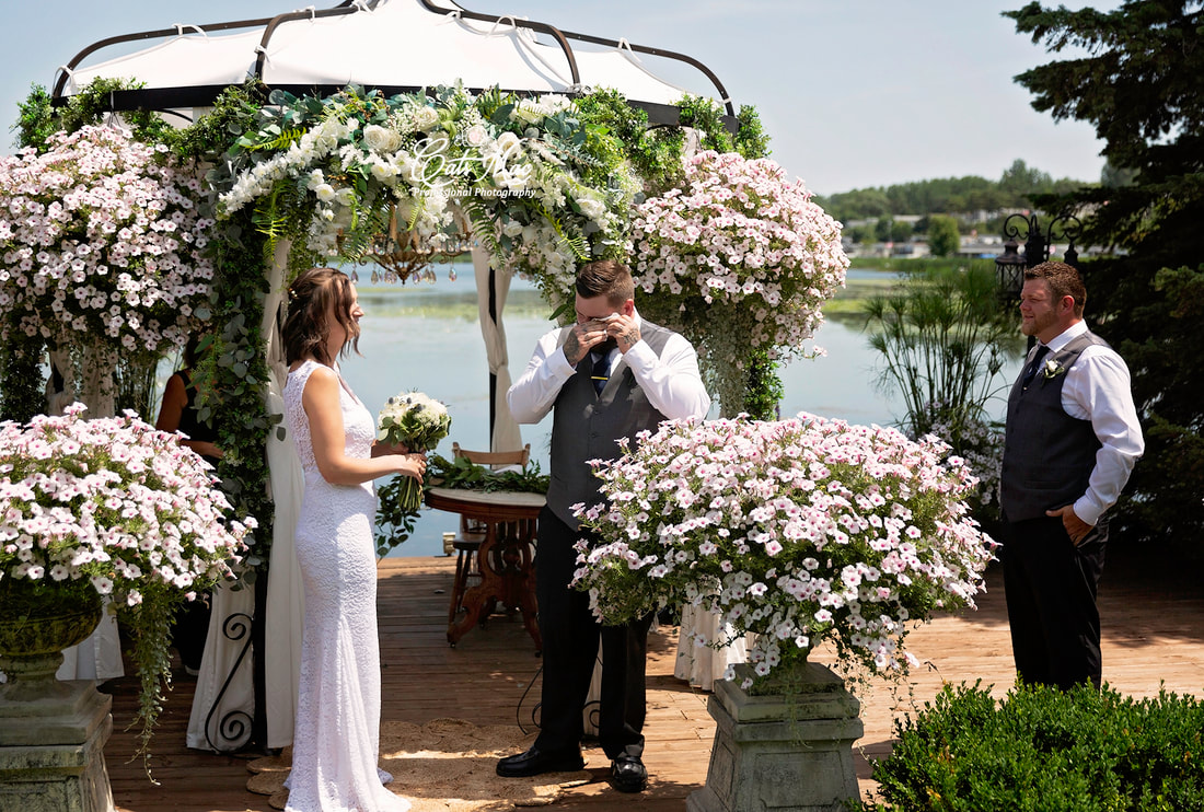 Emotional first look Stillwater on the Lake Chemong bride groom elopement