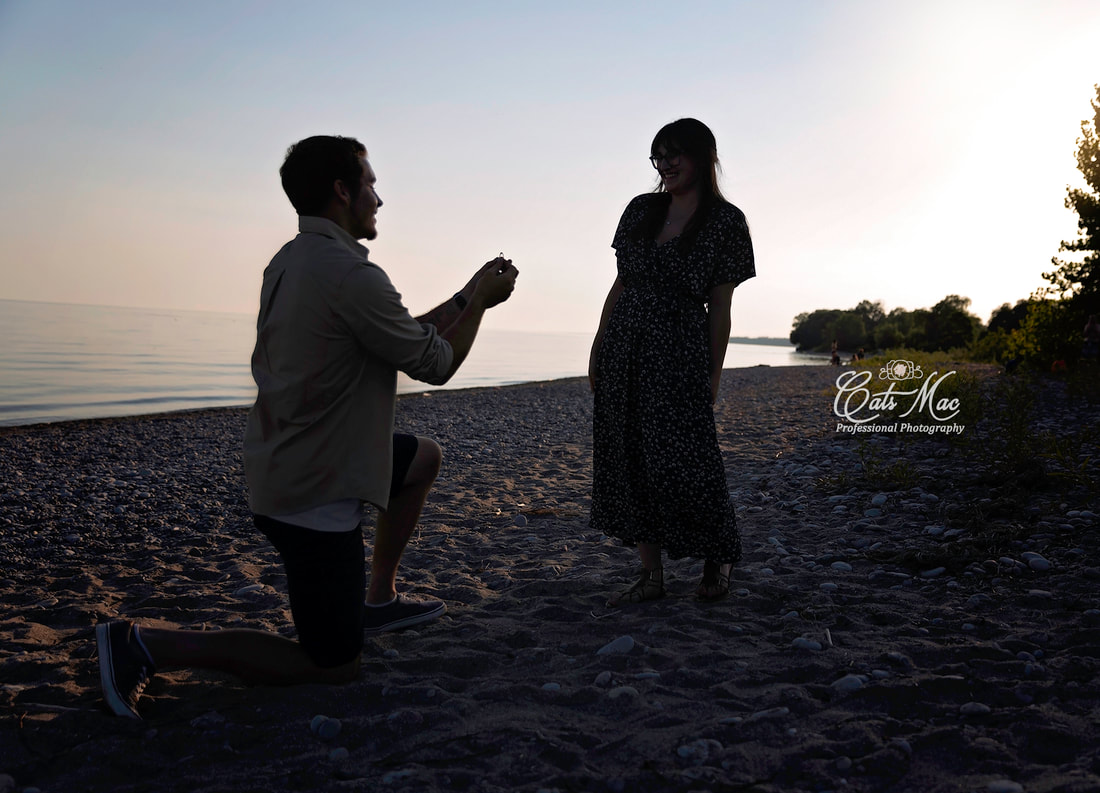 Engagement proposal photo session surprise Cobourg Beach