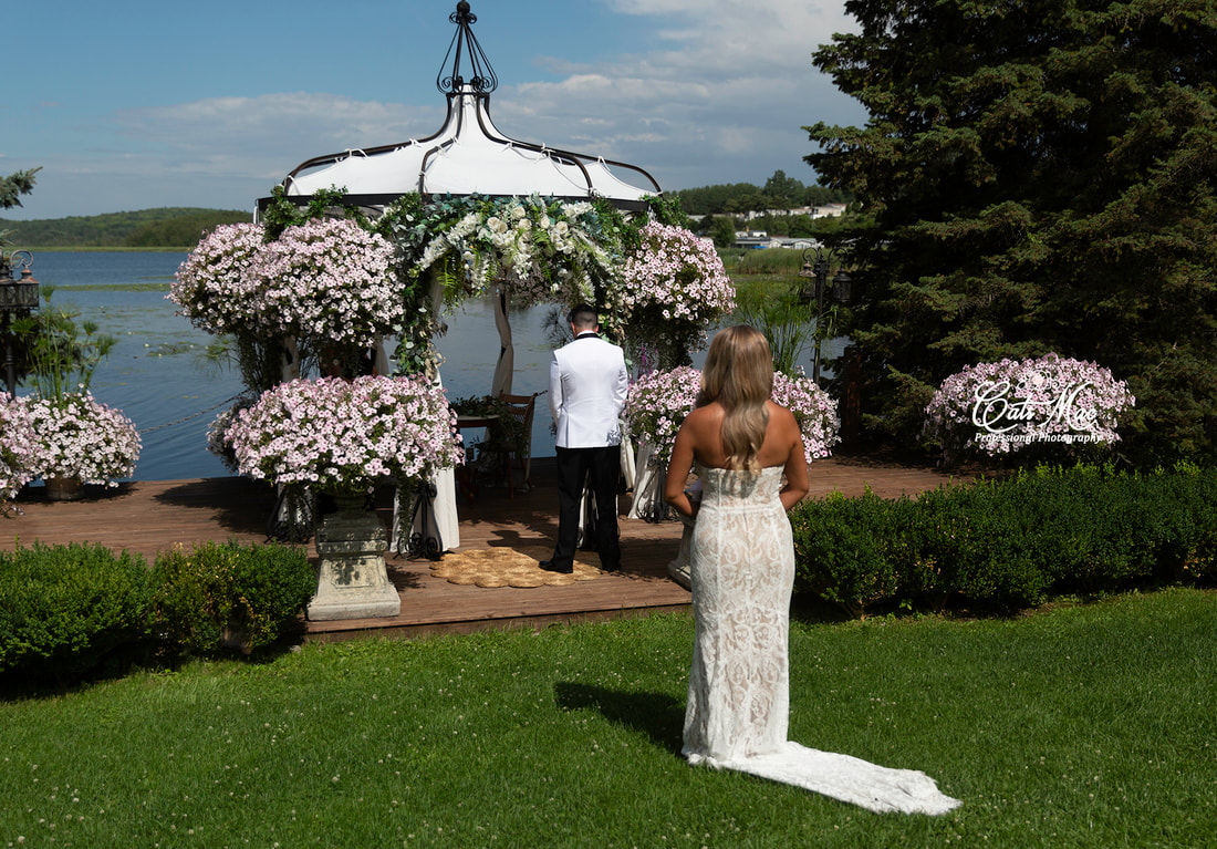 First Look Stillwater on the Lake Chemong elopement bride groom