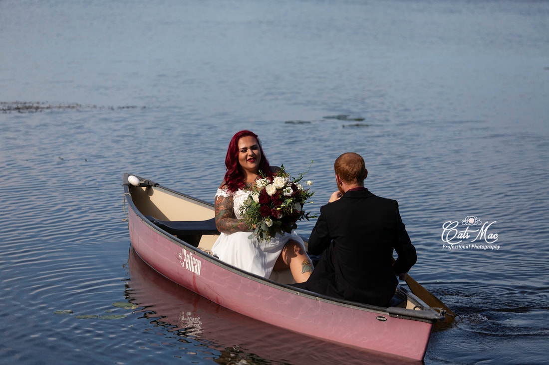 Stillwater on the Lake Chemong Elopement bride groom canoe 