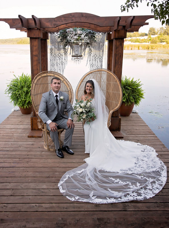 Stillwater on the Lake chemong bride and groom elopement gardens peacock chairs