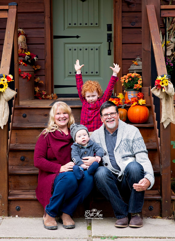 Family Fall photo session pumpkins grandkids grandparents
