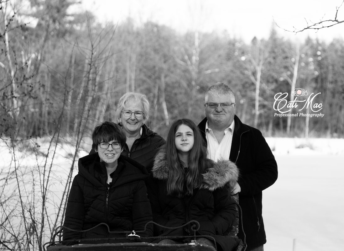 Grandparent family outside winter photo shoot