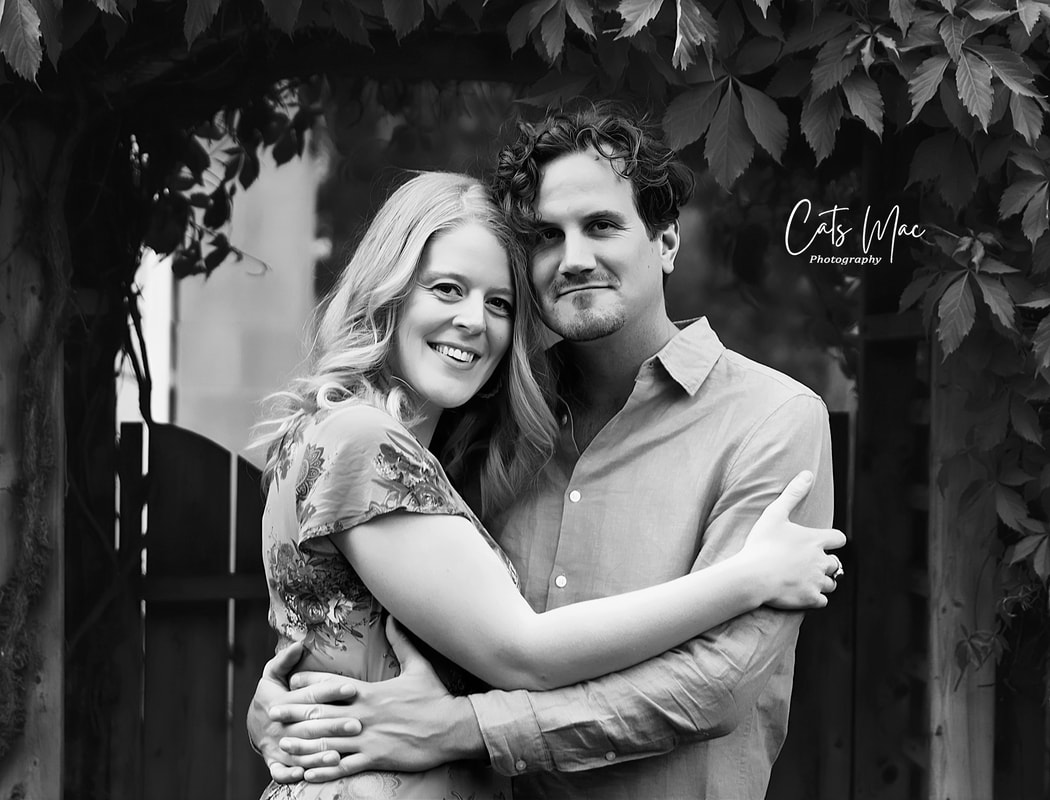 black and white photo of engaged couple