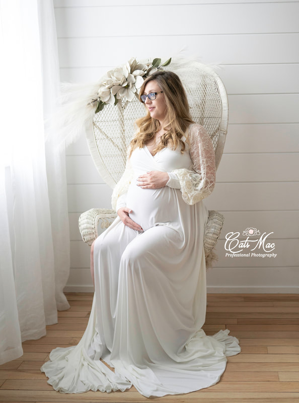 Natural light Maternity Photo session shoot gown peacock chair