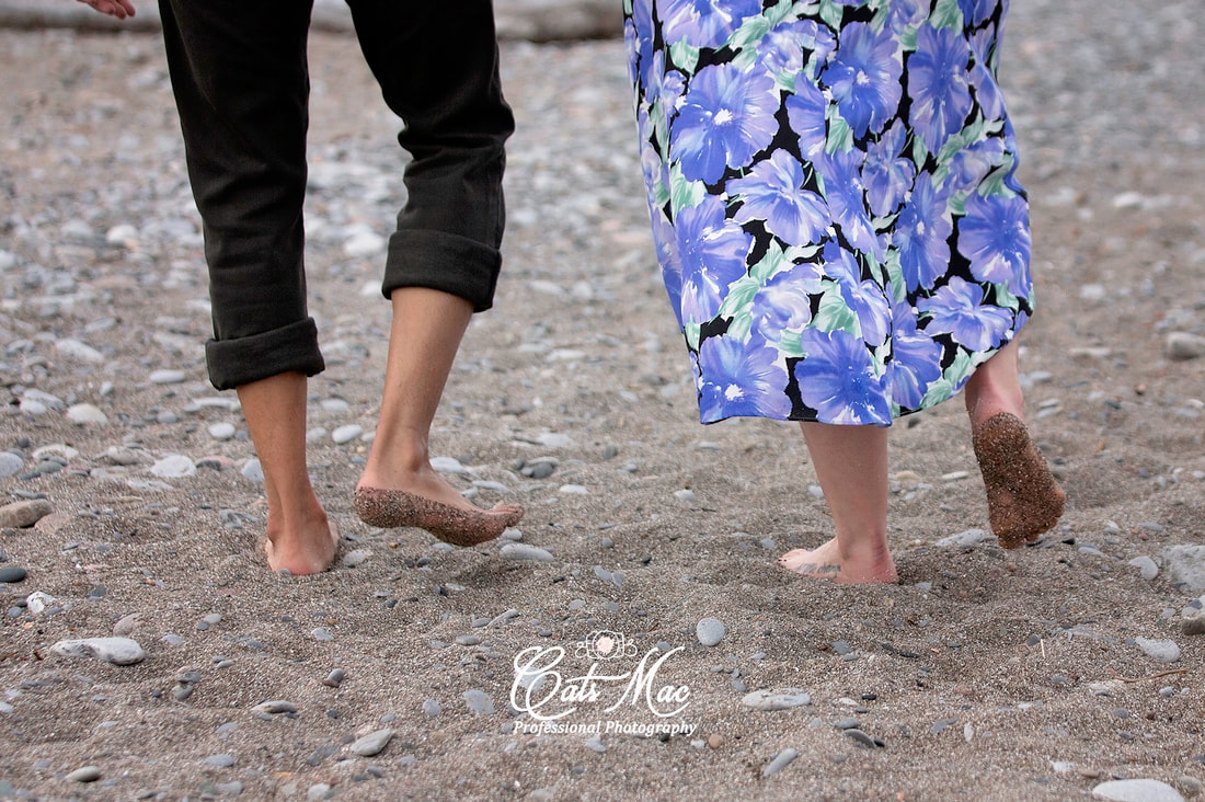 Engagement photos walking in sand feet