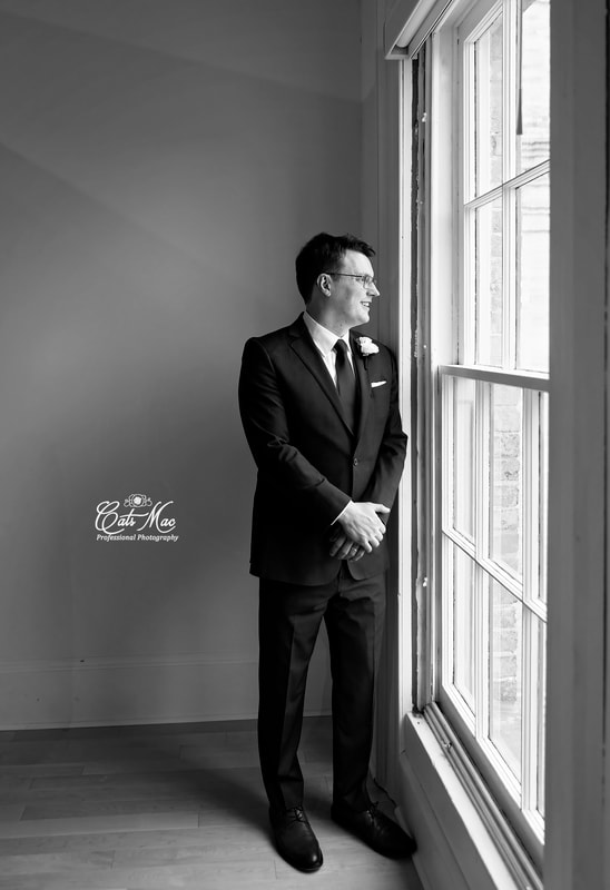 Groom formal photo natural light from window Northumberland Art Gallery