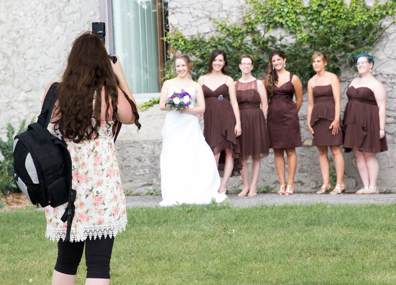 Jenn Schofield wedding photographer with wedding party at Trent University