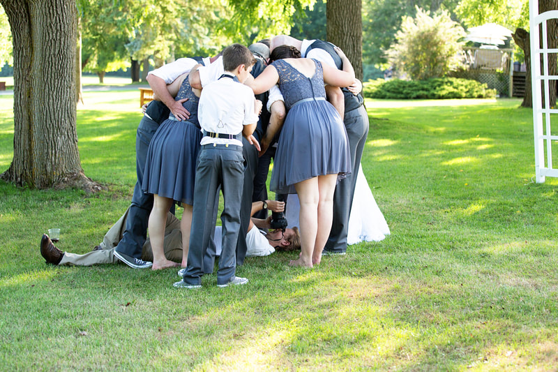 Behind the scenes photographer at wedding