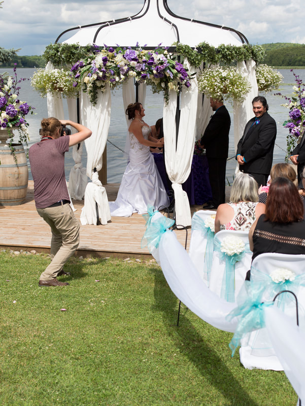 Justin Schofield wedding photography taking photo of wedding ceremony